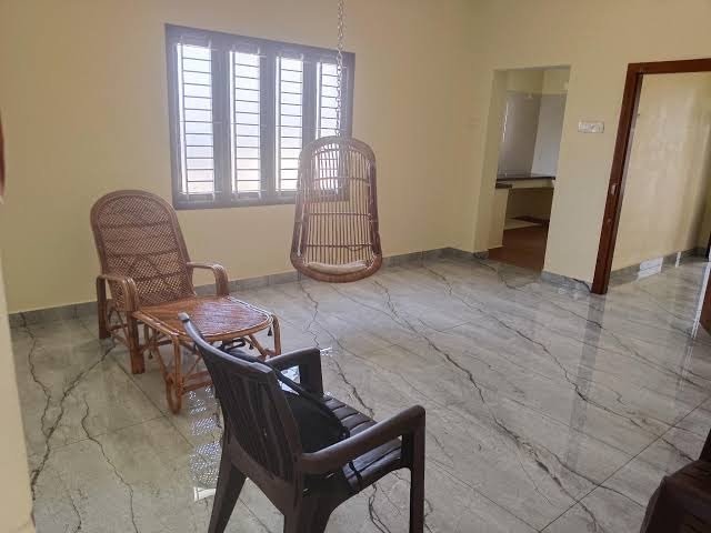 Common area with seating and neat finish
